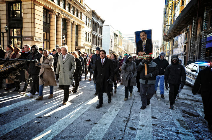 People marching on street for Martin Luther King Jr. Day