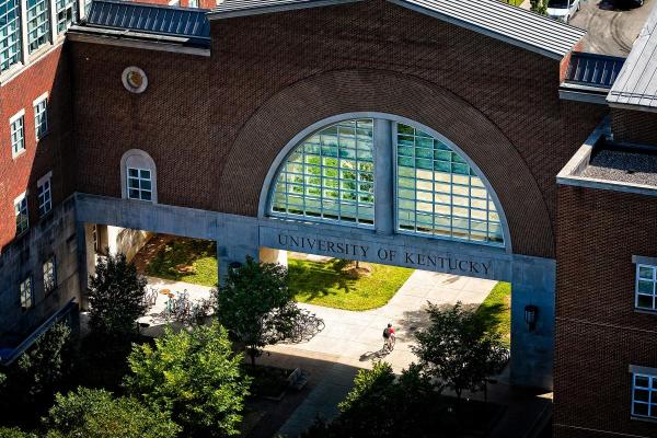 aerial view of arch in building with words University of Kentucky 