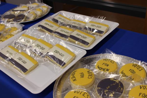yellow cookies wrapped in plastic reading Votes For Women