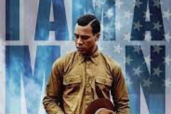 movie poster with black soldier standing in front of large print reading I Am A Man of the 24th