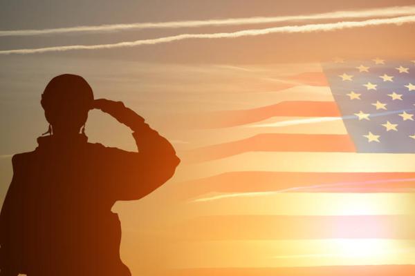 solider saluting American flag