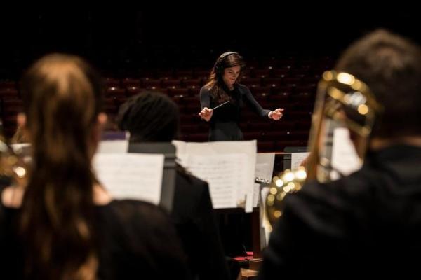 woman conducting orchestra