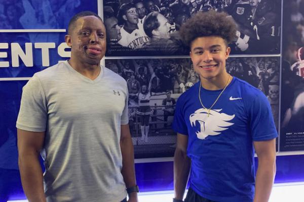 UK alumnus and former football player Harold Dennis with his son Trey, a UK junior and current football player. 